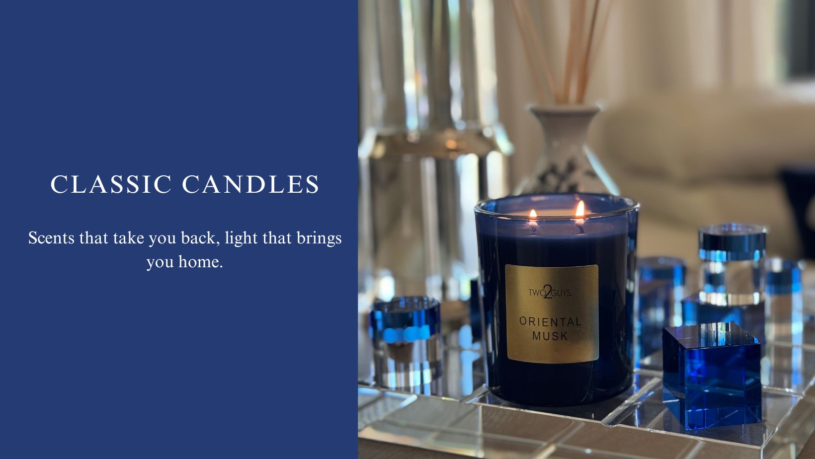 Candle with a gold label on a reflective surface, text about classic candles. Oriental Musk with notes of spicy, sandalwood and musk