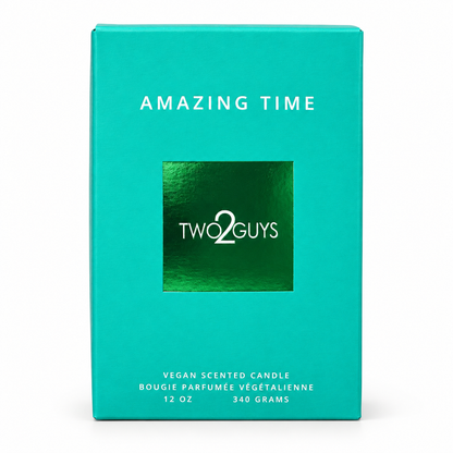 A turquoise and green product box for a Two2Guys 'Amazing Time' vegan scented candle, shown on a clean white background.