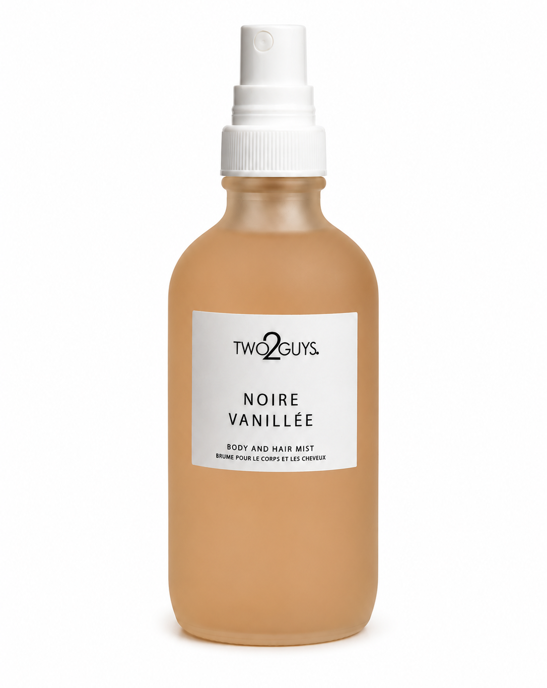 A frosted glass spray bottle of Two2Guys Noire Vanillée body and hair mist, filled with a warm tan liquid, featuring a white label and white spray nozzle on a white background.